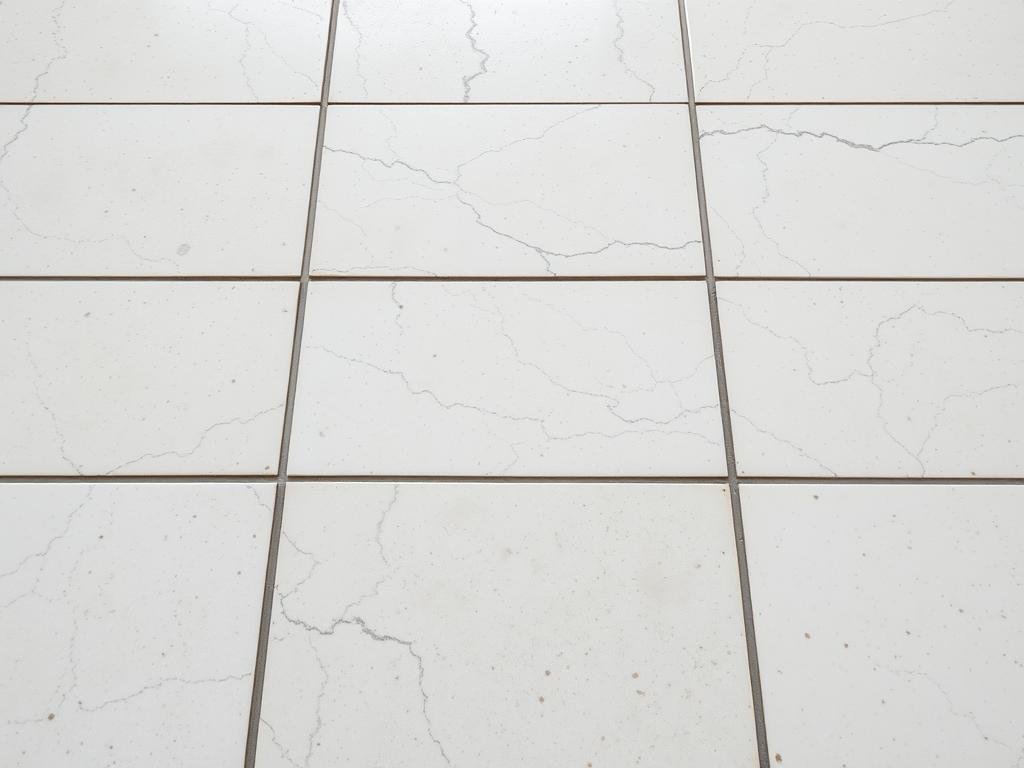 An Ancient White Marble Relief Of A Stone Cobblestone Floor Arranged In A Regular Grid Pattern The Individual